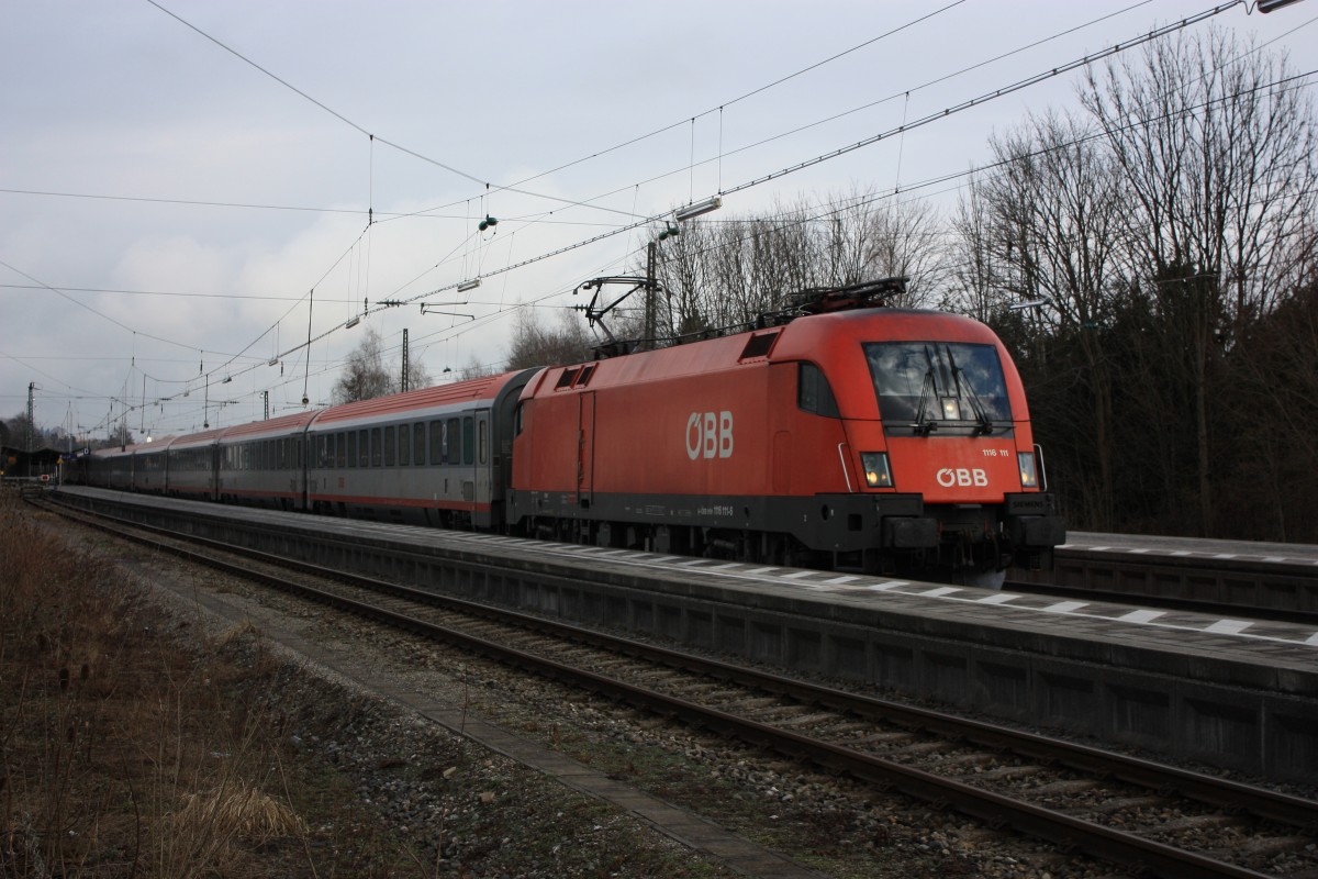1116 111-6 am 11. Mrz 2013 im Bahnhof von Prien am Chiemsee.