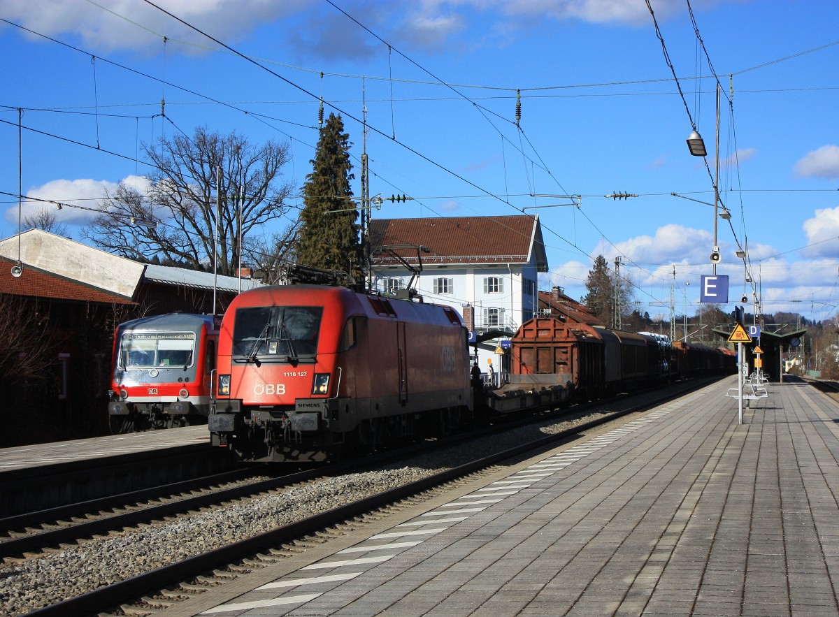 1116 127-2 war am 14. Februar 2014 mit einem gemischten Gterzug nach Salzburg unterwegs. Aufgenommen im Bahnhof von Prien am Chiemsee.