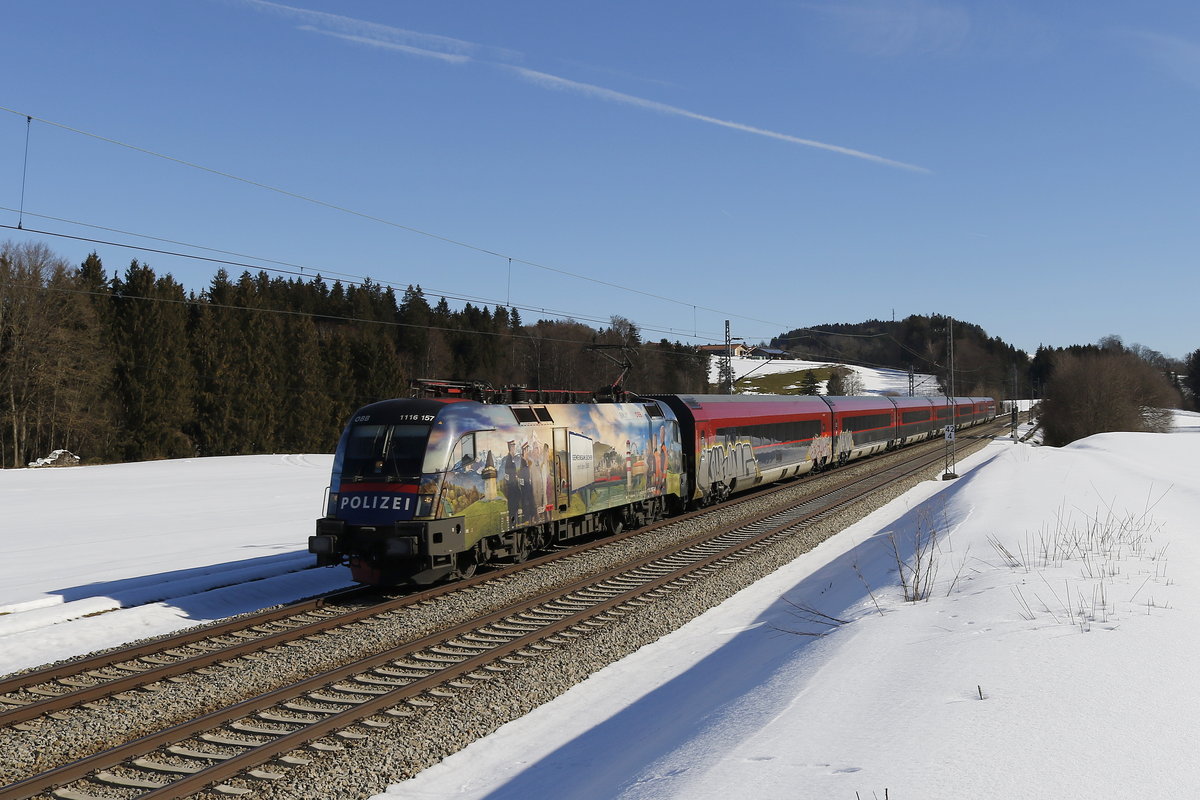 1116 157 mit einem  Railjet  aus Salzburg kommend am 17. Februar 2019 bei Htt.