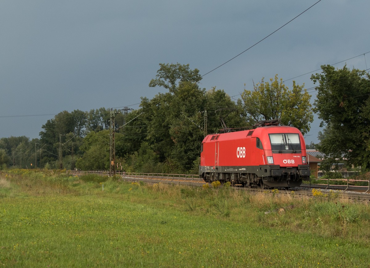 1116 173 fuhr am 11. September 2015 bei Happing in Richtung Rosenheim.