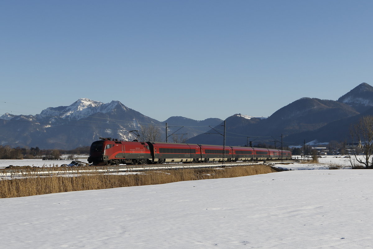 1116 241 mit einem  Railjet  aus Salzburg kommend am 15. Februar 2019 bei Bernau am Chiemsee.