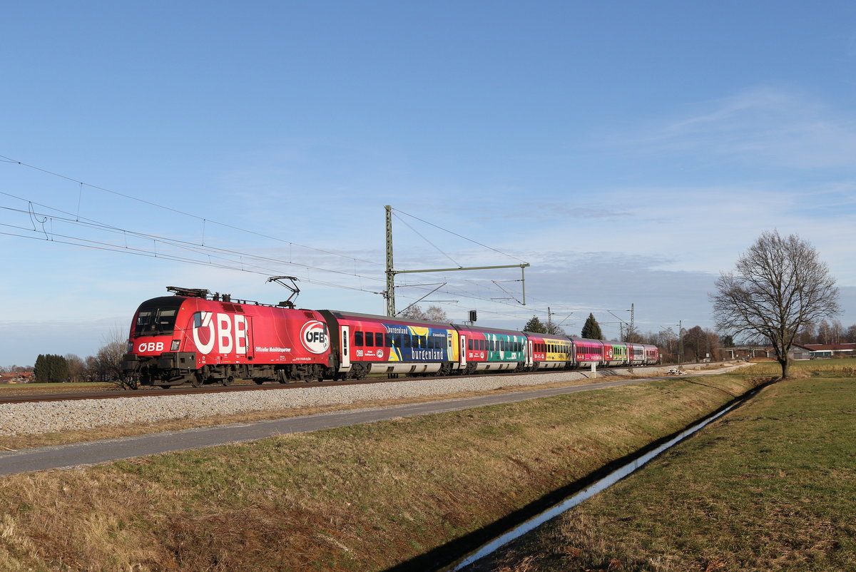 1116 249 mit dem  FB-Werbe-Railjet  am 30. Dezember 2019 aus Salzburg kommend. Aufgenommen bei bersee am Chiemsee.
