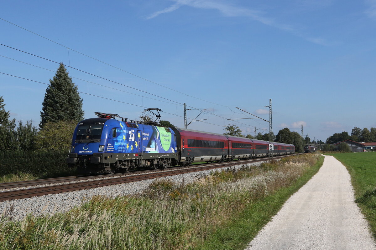 1116 276  EU-Lok  war am 11. Oktober 2021 bei bersee am Chiemsee in Richtung Mnchen unterwegs.