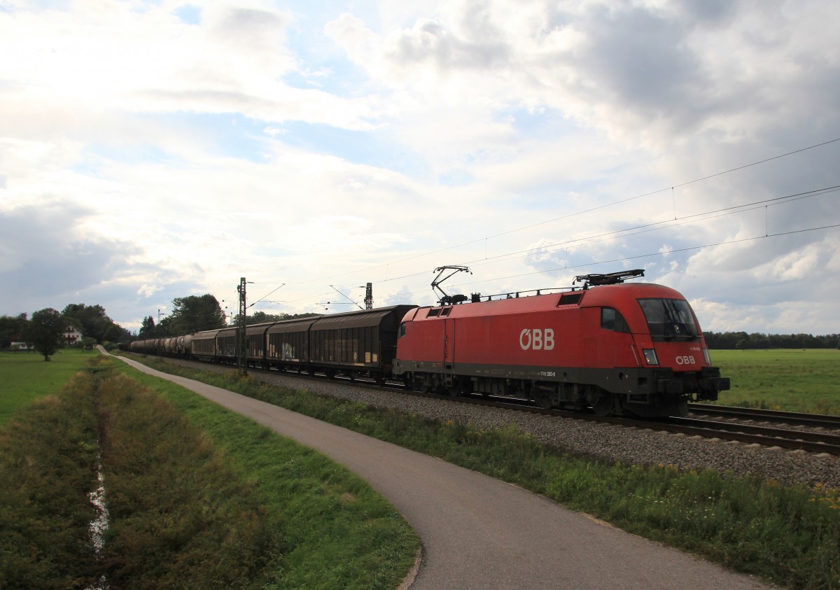 1116 280-9 war am 15. August 2014 mit einem gemischten Gterzug bei bersee in Richtung Salzburg unterwegs.