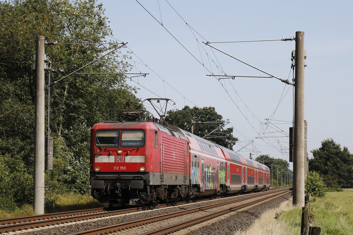 112 150 war mit einem Regionalzug am 15. August 2017 bei Wulfsmoor in Richtung Hamburg unterwegs.