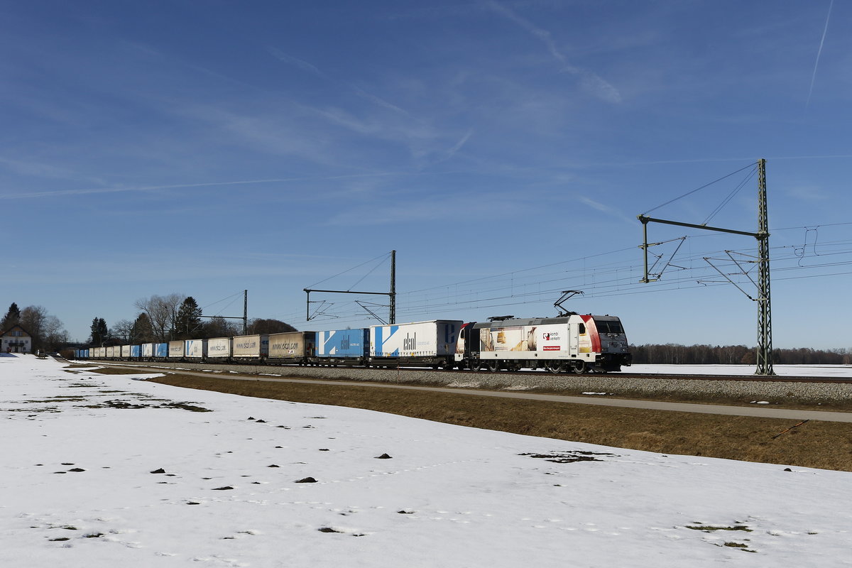 185 664 mit dem  Ekol  auf dem Weg nach Freilassing am 16. Februar 2019 bei bersee am Chiemsee.