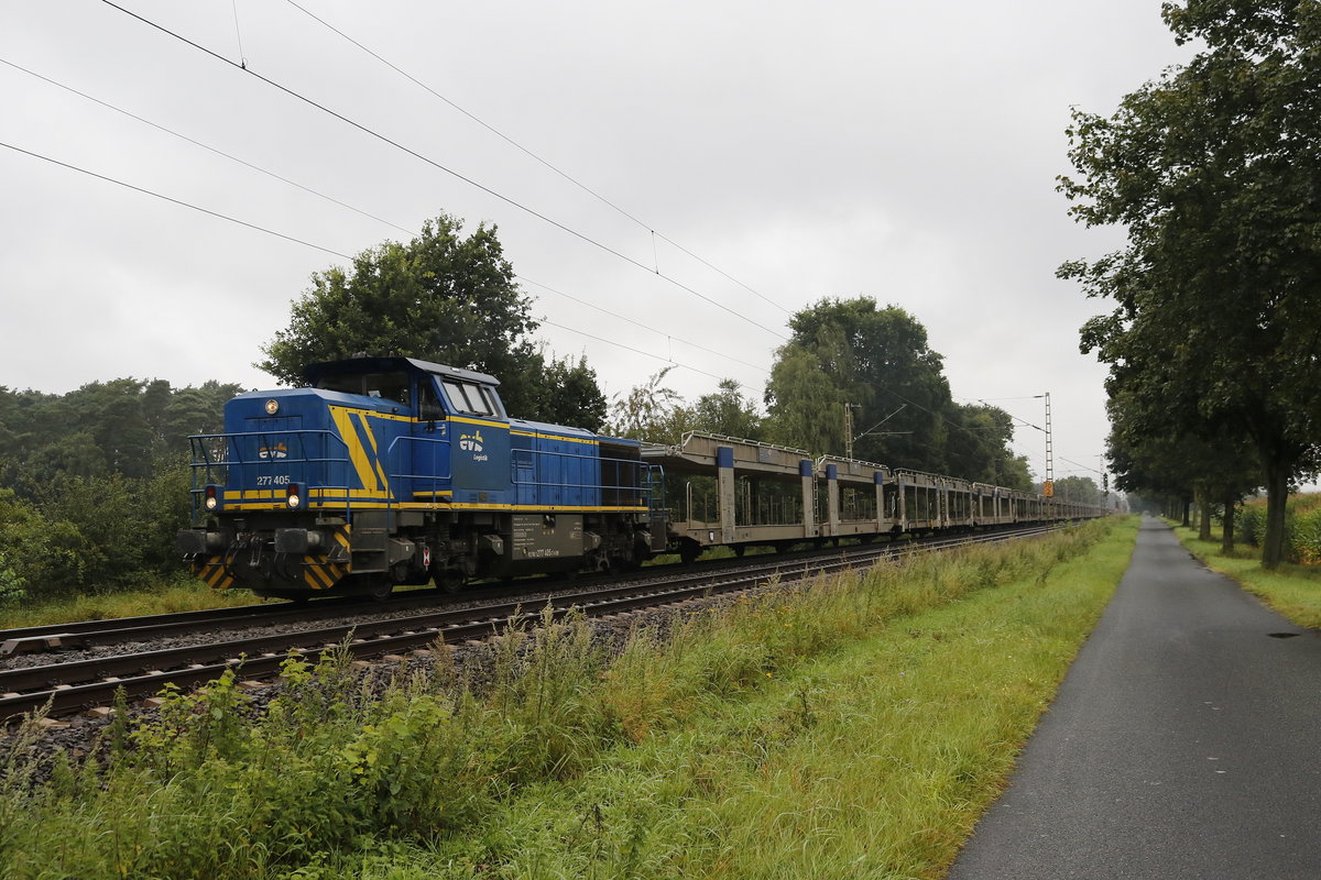 277 405 von  EVB  mit einem leeren Autozug am 11. August 2017 bei Drverden.