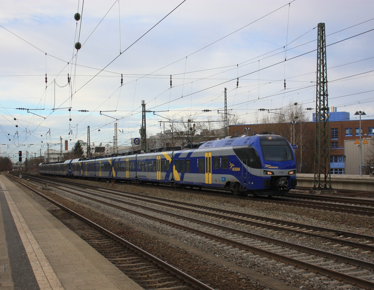ET 308 durchfhrt am 3. Januar 2014 vom Hauptbahnhof kommend Mnchen/Heimeranplatz.