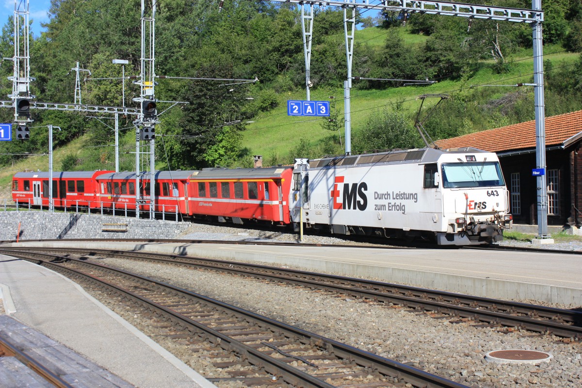 Ge 4/4 III  EMS Chemie  verläßt am Morgen des 18. August 2014 den Bahnhof von Filisur in Richtung Davos.