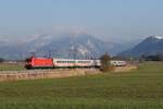 101 114 schob den  EC 219  nach Salzburg. Aufgenommen am 4. April 2022 bei Bernau am Chiemsee.