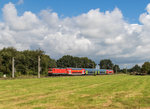 112 142 mit einem Regionalzug am 30. August 2016 bei Wulfsmoor.