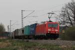 185 350-0 mit einem Containerzug aus München kommend bei Weisham am 3. April 2014.