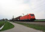 185 238-3 durchfuhr am 5. April 2014 mit einem Güterzug den Chiemgau. Aufgenommen bei Übersee am Chiemsee.