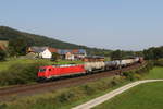 185 631 mit einem Kesselwagenzug aus Bebra kommend am 27. August 2019 bei Hermannspiegel.