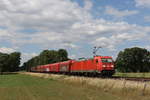 BR 185/707807/185-230-mit-einem-gemischten-gueterzug 185 230 mit einem gemischten Gterzug am 29. Juni 2020 bei Nindorf in Niedersachsen.