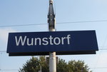 Bahnhofsschild von  Wunstorf  bei Hannover am 27. August 2016.