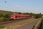 BR 425/784977/425-047-am-4-august-2022 425 047 am 4. August 2022 bei Winterhausen mit dem Ziel Wrzburg Hauptbahnhof.
