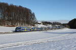 Bayerische Regiobahn/833834/430-014-430-007-und-430 430 014, 430 007 und 430 026 waren am 9. Dezember 2023 bei Axdorf im Chiemgau auf dem Weg nach Mnchen.