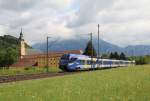 ET 322 fhrt auf dem Weg von Kufstein nach Rosenheim am 2. Mai 2014 soeben an Kloster Reisach vorbei.