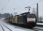 189 280 am 12. Januar 2013 bei durchfahren des Bahnhofs von Assling.