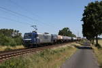 RBH/705990/145-019-mit-einem-kesselwagenzug-am 145 019 mit einem Kesselwagenzug am 26. Juni 2020 bei Drverden.
