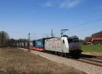 185 538-6 ist mit dem  Walter-Zug  am 30. März 2014 bei Übersee in Richtung Salzburg unterwegs.