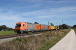 2016 907 & 1247 903 von  RTS  waren am 20. Oktober 2021 mit einem Bauzug bei bersee am Chiemsee in Richtung Rosenheim unterwegs.
