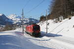 1016 030 auf dem Weg nach Bischofshofen am 12. Februar 2022 bei Pfaffenschwendt/Tirol.