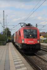 1116 025-6 am 21. September 2013 bei der Einfahrt in den Bahnhof von Prien am Chiemsee.