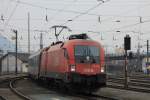 1116 105-8 am 29. Mrz 2013 bei der Einfahrt in den Bahnhof von Traunstein.