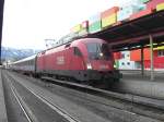 1116 154-4 bei der Ausfahrt aus dem Hauptbahnhof von Salzburg.