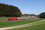 1116 281 war am 11. Oktober 2023 mit einem  EC  bei Axdorf in Richtung Mnchen unterwegs.