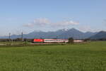 br-1116/864797/1116-105-mit-einem-ec-aus 1116 105 mit einem 'EC' aus Salzburg kommend am 18. September 2024 bei Bernau am Chiemsee.