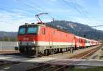 1144 229 war am 20. Oktober 2013 mit einem  REX  von Salzburg nach Wrgl unterwegs. Das Foto endstand bei St. Johann in Tirol.