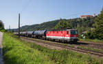 br-1144/580384/1144-260-7-mit-einem-kesselwagenzug-am 1144 260-7 mit einem Kesselwagenzug am 23. September 2017 bei Wernstein.