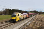 1116 153 AMTC schob am 27. Februar 2020 bei Grabensttt im Chiemgau einen Railjet in Richtung Salzburg.