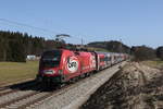 1116 249 war mit dem  FB-Railjet  am 25. Februar 2021 bei Grabensttt im Chiemgau auf dem Weg nach Salzburg.