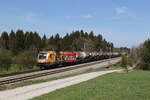 br-xx16-werbeloks/734797/1016-048-mit-einem-kesselwagenzug-aus 1016 048 mit einem Kesselwagenzug aus Salzburg kommend am 28. April 2021 bei Grabensttt im Chiemgau.