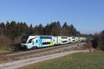 westbahn/802897/4010-022-auf-dem-weg-nach 4010 022 auf dem Weg nach Mnchen am 8. Februar 2023 bei Sossau im Chiemgau.