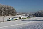 westbahn/838290/4010-030-aus-wien-kommend-am 4010 030 aus Wien kommend am 13. Januar 2024 bei Axdorf im Chiemgau.