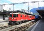 Ge 4/4 II - 613  Domat/Ems  am 19. August 2014 bei der Ausfahrt aus dem Bahnhof von Chur.