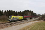 1116 153  AMTC  mit einem Railjet aus Salzburg kommend am 3. Mrz 2021 bei Grabensttt im Chiemgau.