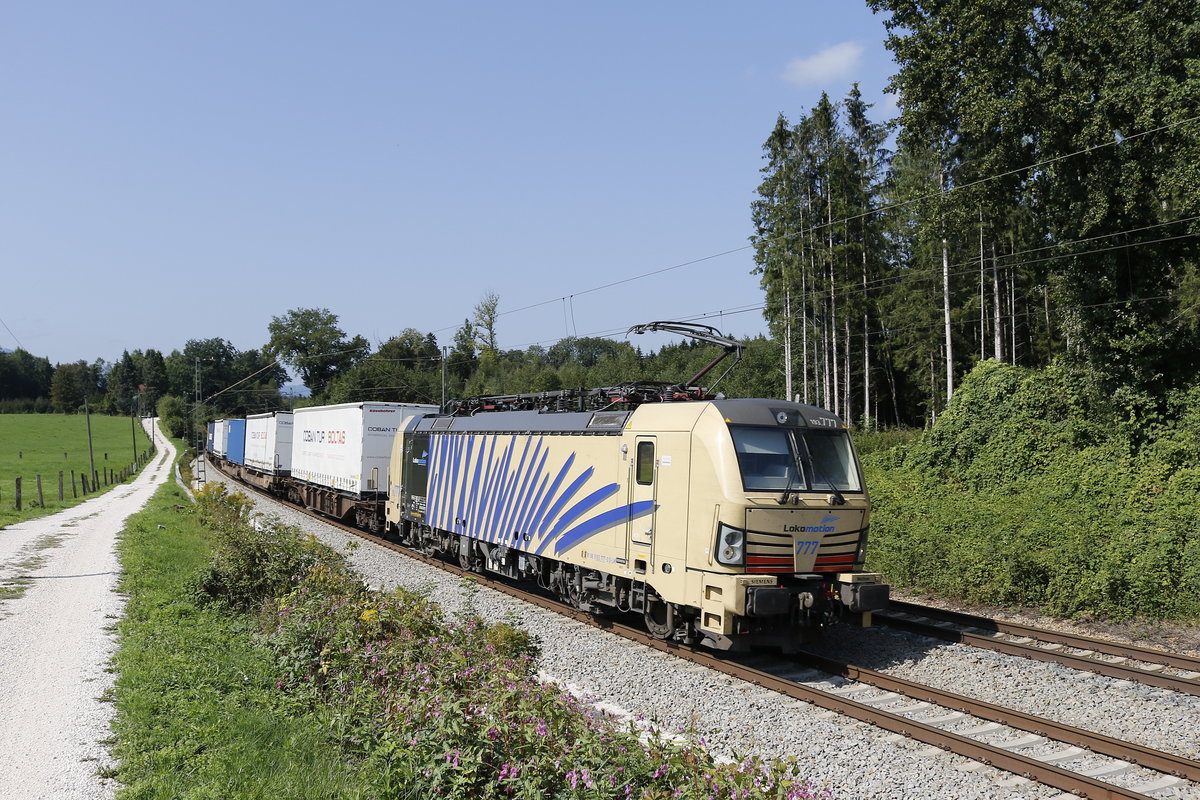 193 777 war am 5. September 2018 mit dem  Ekol-Zug  bei Grabensttt in Richtung Salzburg unterwegs.