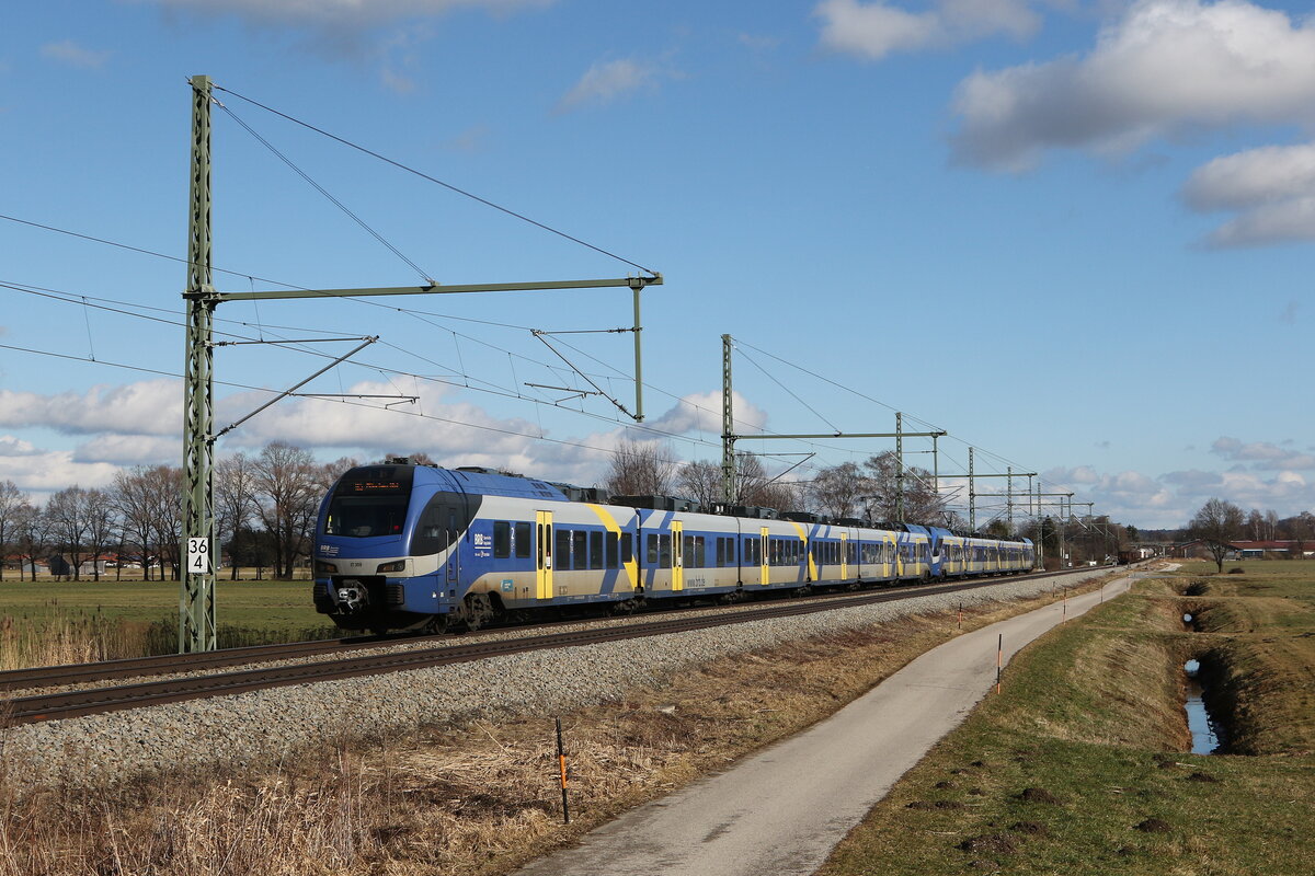 ET 309 auf dem Weg nach München. Aufgenommen am 5. Februar 2022 bei Übersee am Chiemsee.