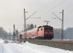 111 179-8 schiebt am 26. Januar 2013 bei bersee einen Regionalzug nach Mnchen.