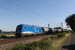 223 033 von  EVB Logistik  mit einem Kesselwagenzug am 26,. Juni 2020 bei Drverden.