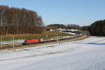 1116 158 war mit einem  Schiebewandwagenzug  am 20. Januar 2026 bei Axdorf im Chiemgau in Richtung Rosenheim unterwegs.