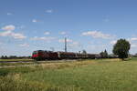 1293 198 war mit einem gemischten G�terzug am 4. Juli 2026 bei �bersee am Chiemsee in Richtung M�nchen unterwegs.