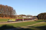 1116 153  AMTC  mit einem Railjet aus Salzburg kommend am 18. Dezember 2023 bei Axdorf im Chiemgau.